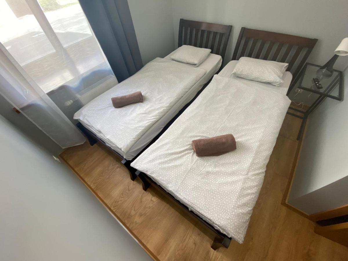 Aparthotel Riga Bagian luar foto Two single beds