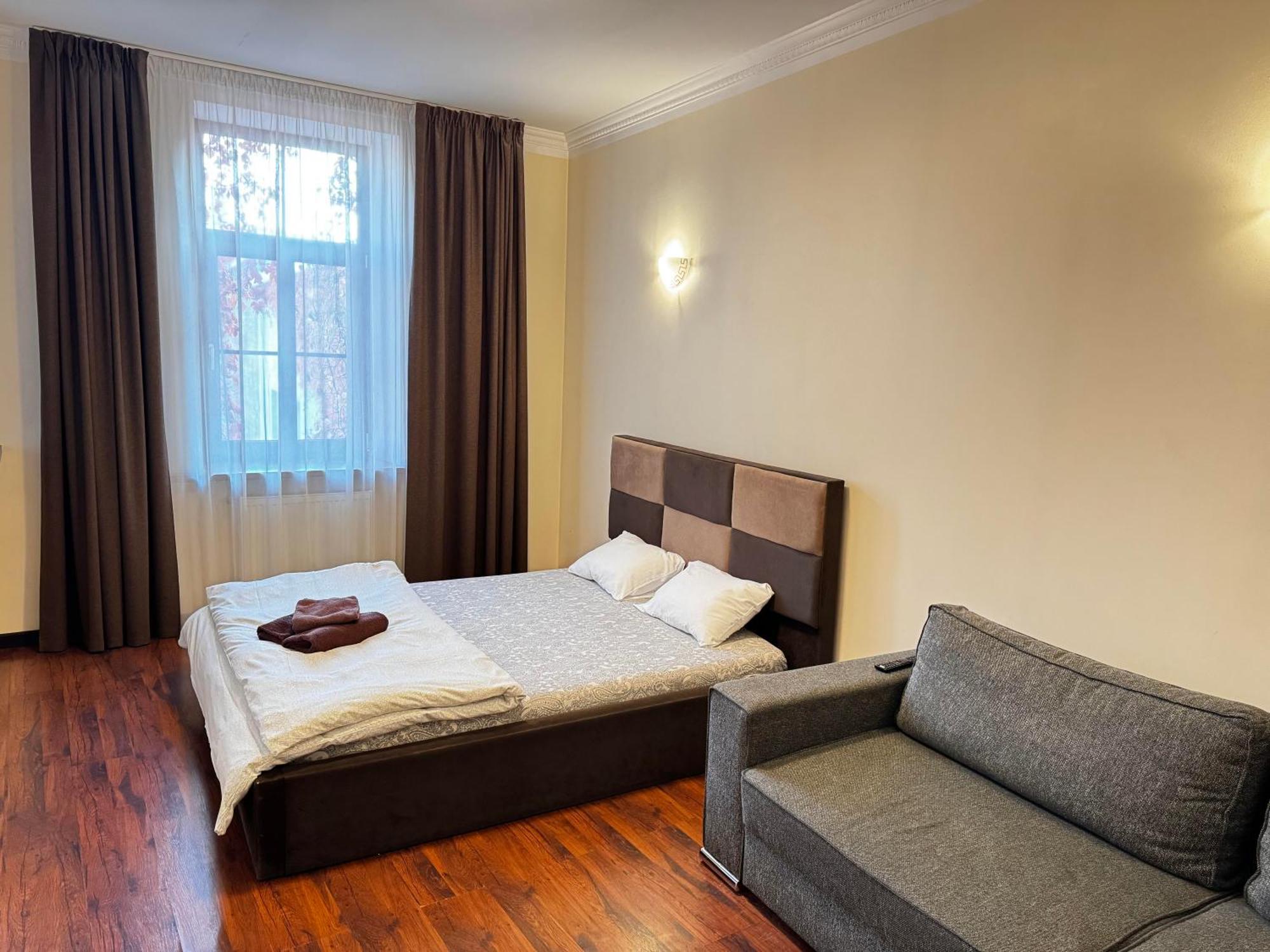 Aparthotel Riga Bagian luar foto A bedroom in a hotel