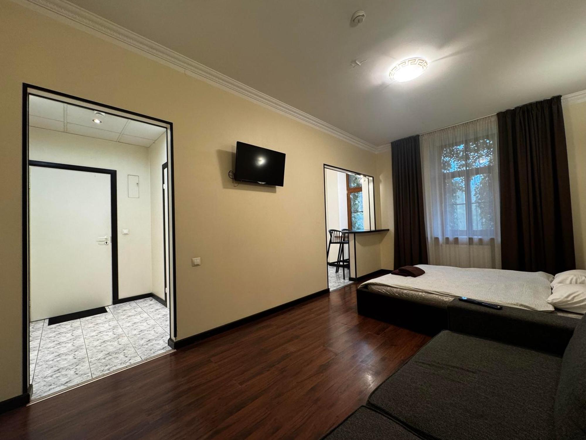 Aparthotel Riga Bagian luar foto A room at the hotel