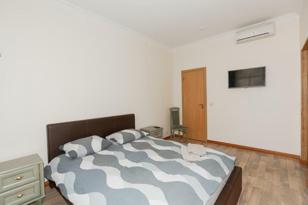 Aparthotel Riga Bagian luar foto A bedroom in a hotel